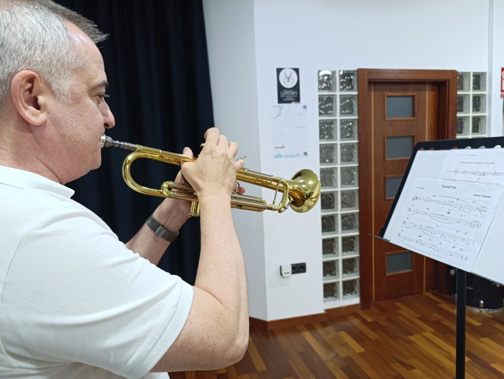 a man playing a trumpet